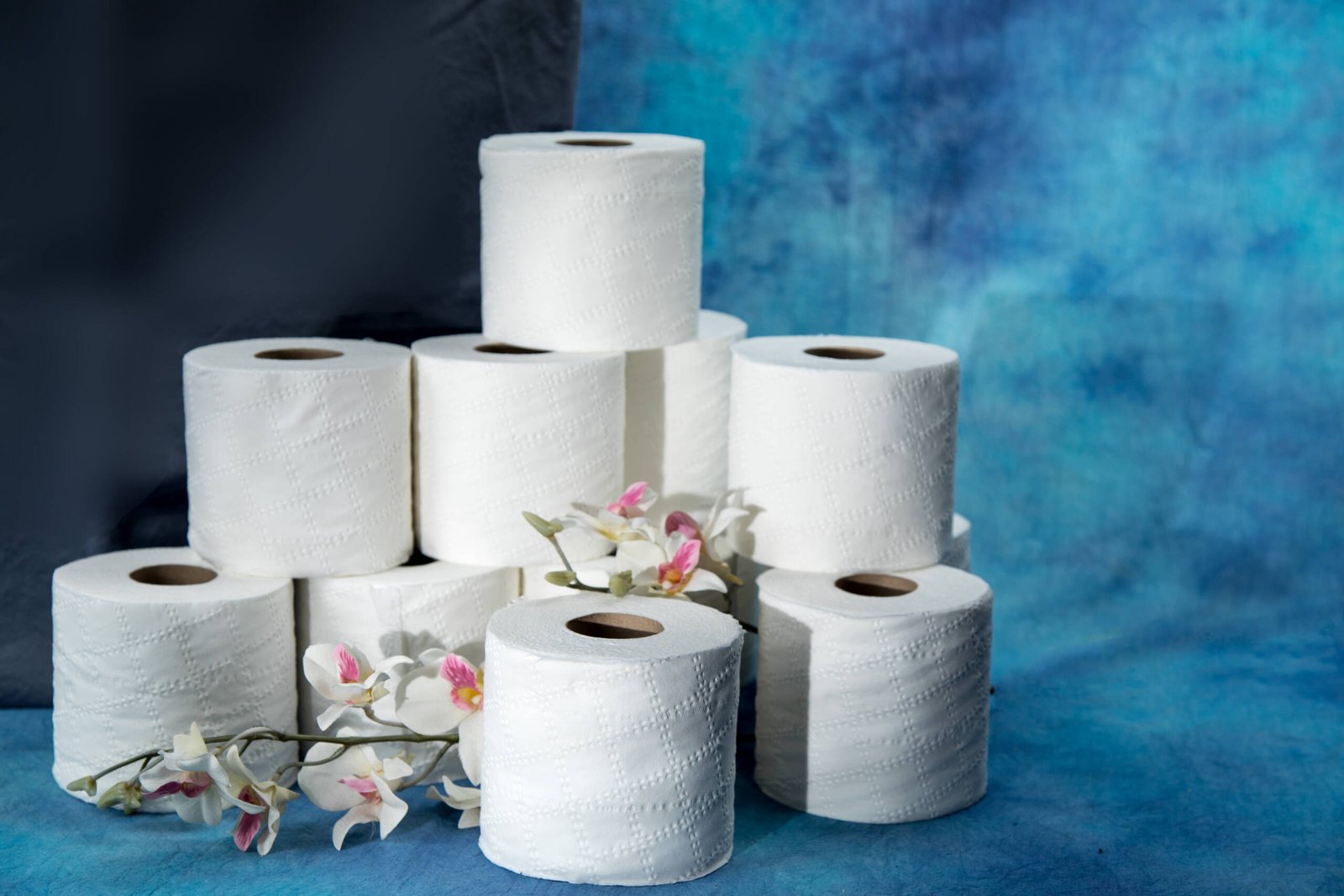 rolls-of-toilet-paper-with-white-flowers-on-a-dram-2026-01-11-09-22-09-utc